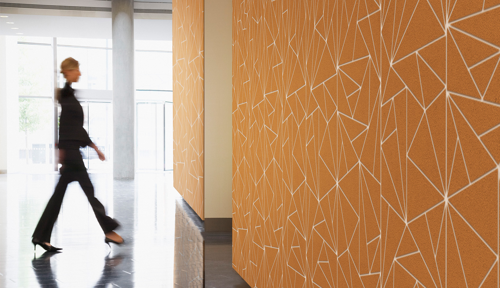 MPS Acoustics Gold Sand Fractured Wall Panel in a Lobby